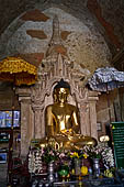 Bagan Myanmar. Htilominlo temple. Main Buddha statue of the ground floor. 